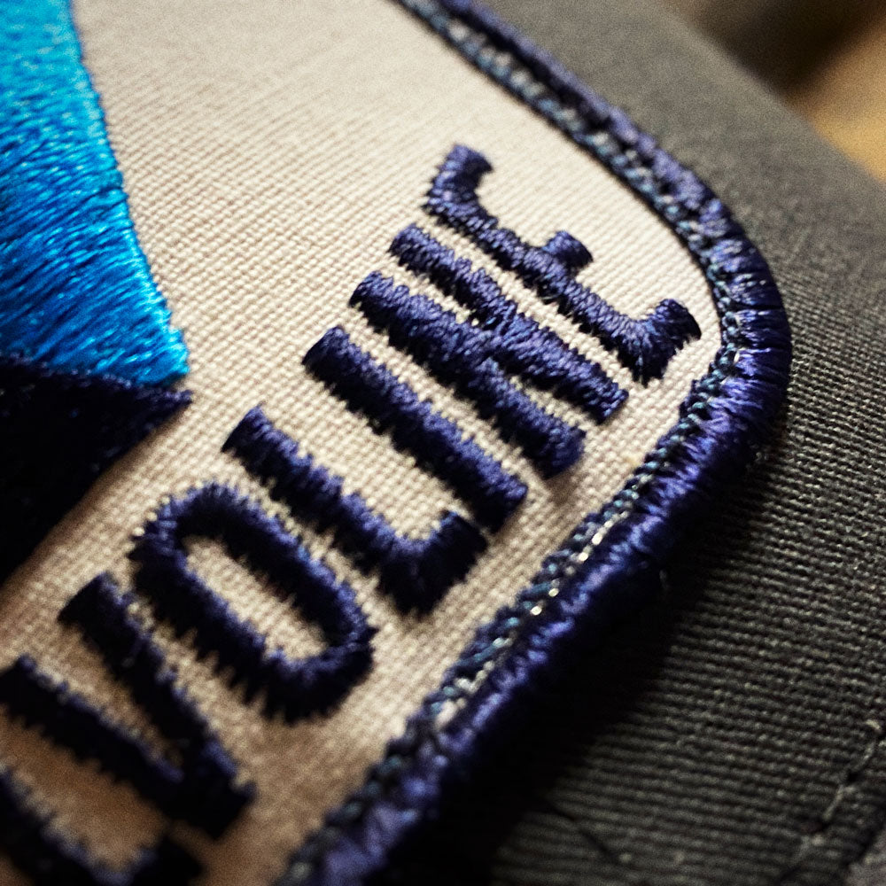 Casquette retro trucker avec écusson vintage "Valvoline"